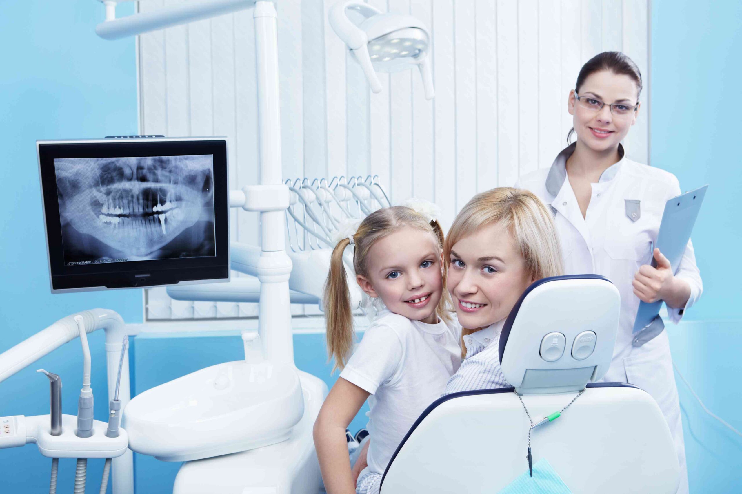 Family with child at a dental office.